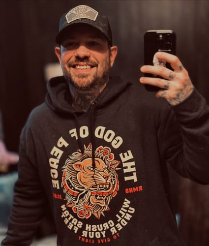 Customer photo review of The World Tour Tee