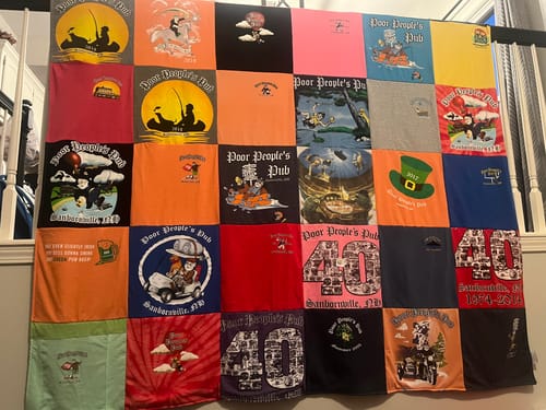T-shirt quilt with pub culture, celebrations themes by Pamela from MO