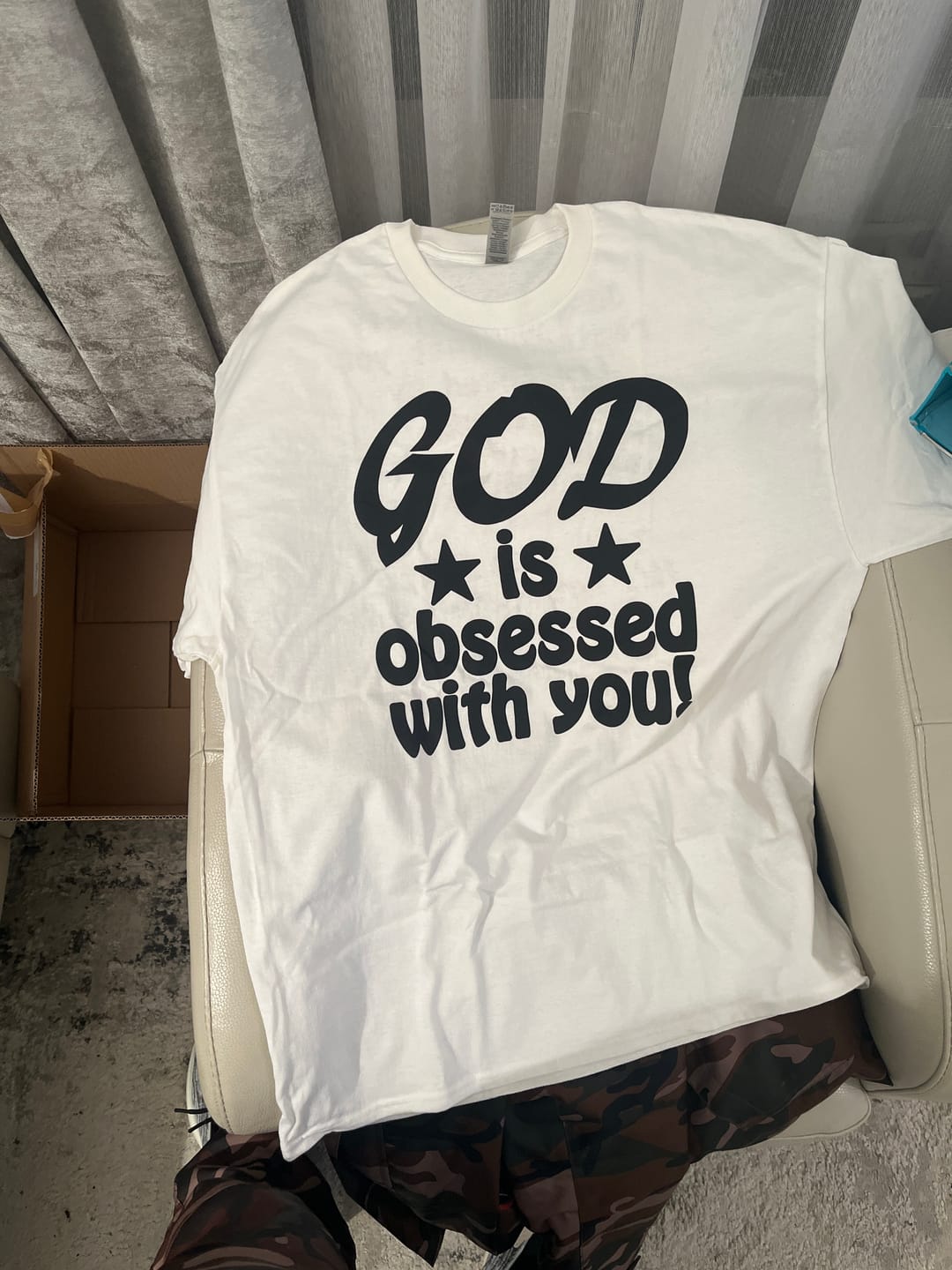 Customer photo review of GOD IS OBSESSED T-SHIRT