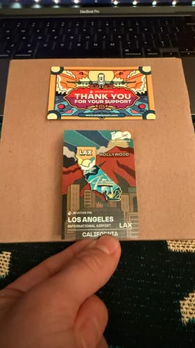 Customer photo review of Airport Enamel Pin | LAX - California