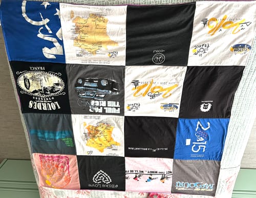 T-shirt quilt with travel, maps themes by Suzanne from FL