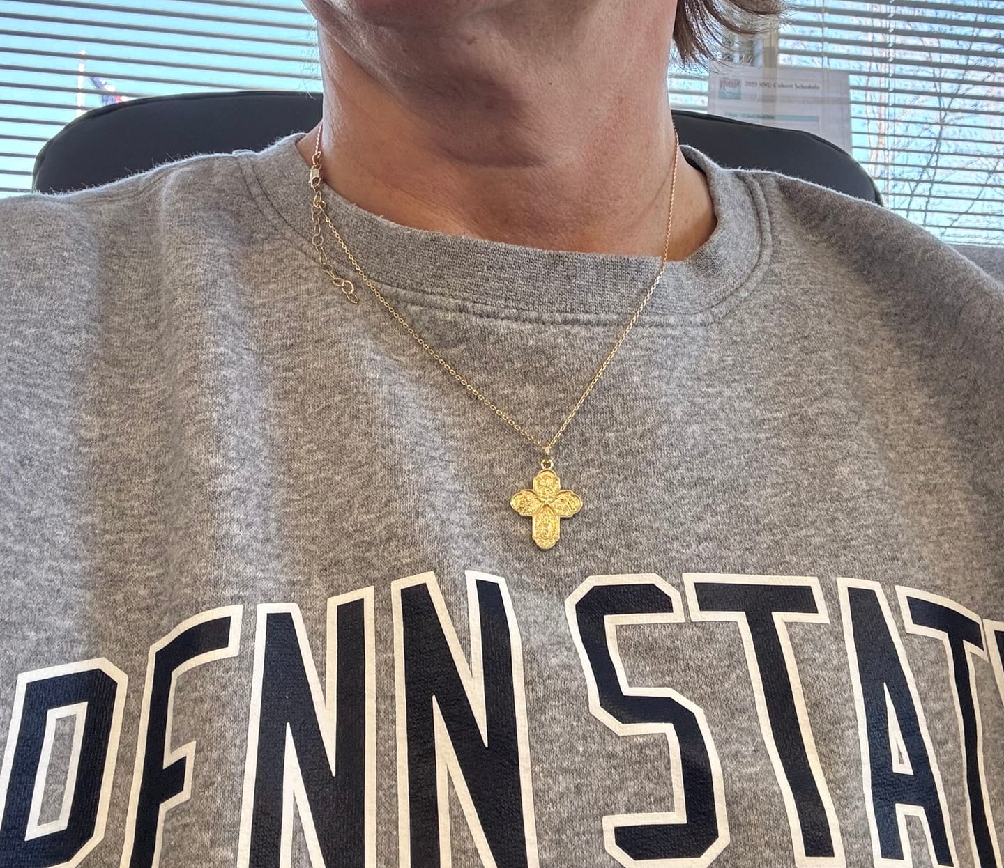 Customer photo review of The Four Way Cross Medal Necklace