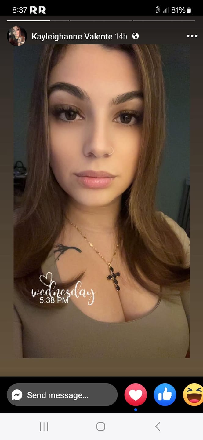 Customer photo review of Noir Cross Necklace