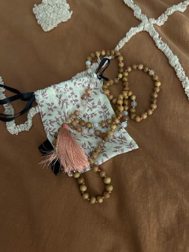 Customer photo review of Mysore Sandalwood and Moonstone Mala
