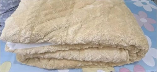 Customer photo review of SnuggleSnow Winter Fleece Blanket