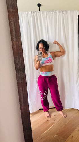 Customer photo review of Salty Savage Ladies “Spliced Smile” Fleece Sweatpants | Magenta