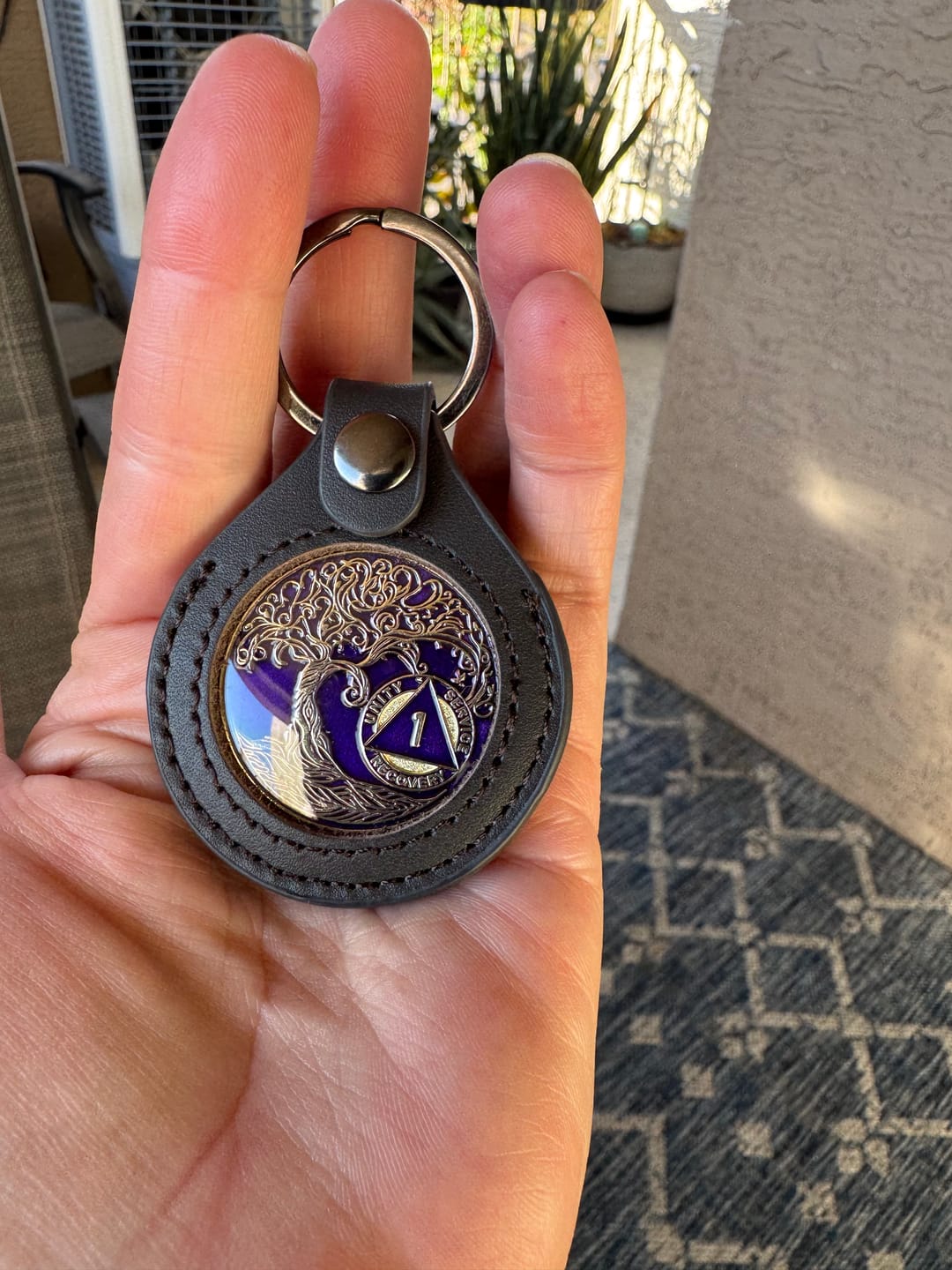 Customer photo review of Sobriety Mint Genuine Leather 40mm AA Medallion Keychain Holder - Recovery Chip/Coin/Token Holder - Black