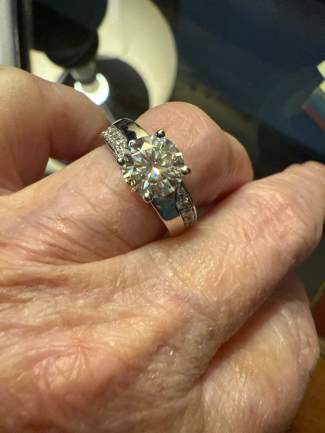 Customer photo review of Round Moissanite Offset Side Stone Row Engagement Ring
