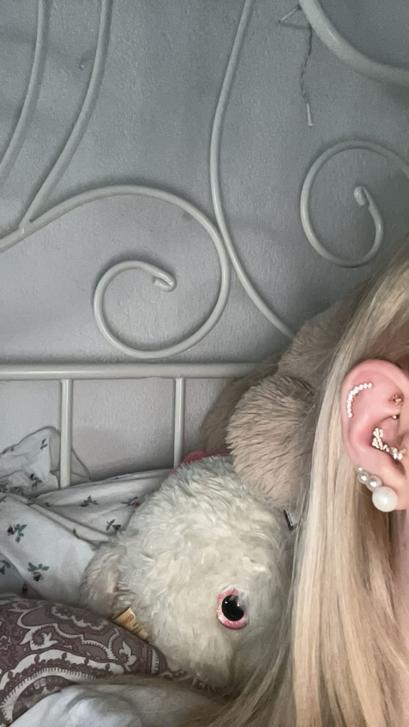 Customer photo review of Bright Bow Piercing | Titan