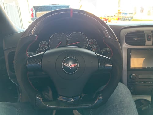 Customer photo review of Genuine Carbon Fiber Steering Wheel With Button Trim For C6 Corvette 2006-2011