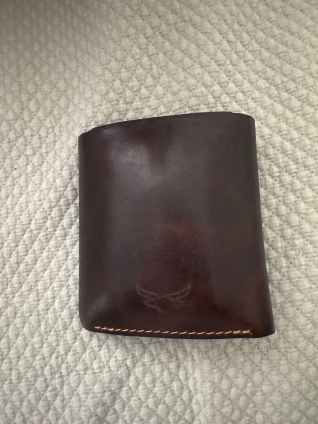 Customer photo review of Badge Trifold Wallet