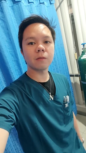 Customer photo review of 4-Pocket MoveTech® Scrub Top - Men / Pacific Tide