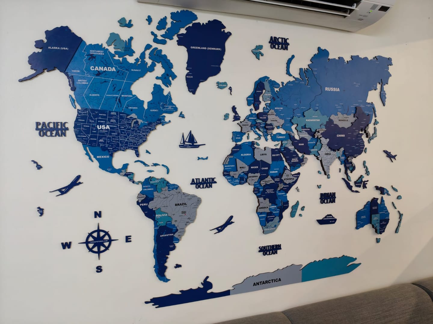 Customer photo review of 3D Tory Blue Wooden World Map for wall
