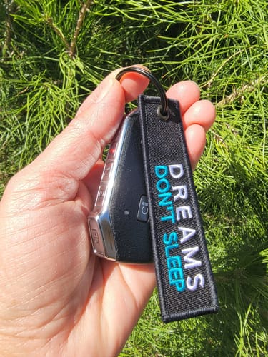 Customer photo review of DREAMS DON'T SLEEP KEY TAG