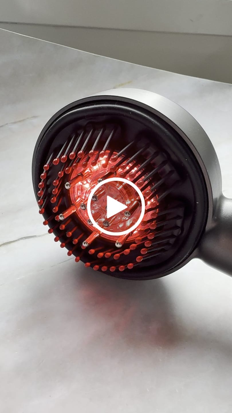 Customer video review of 3-in-1 Premium Light Therapy and Oil Massage Brush