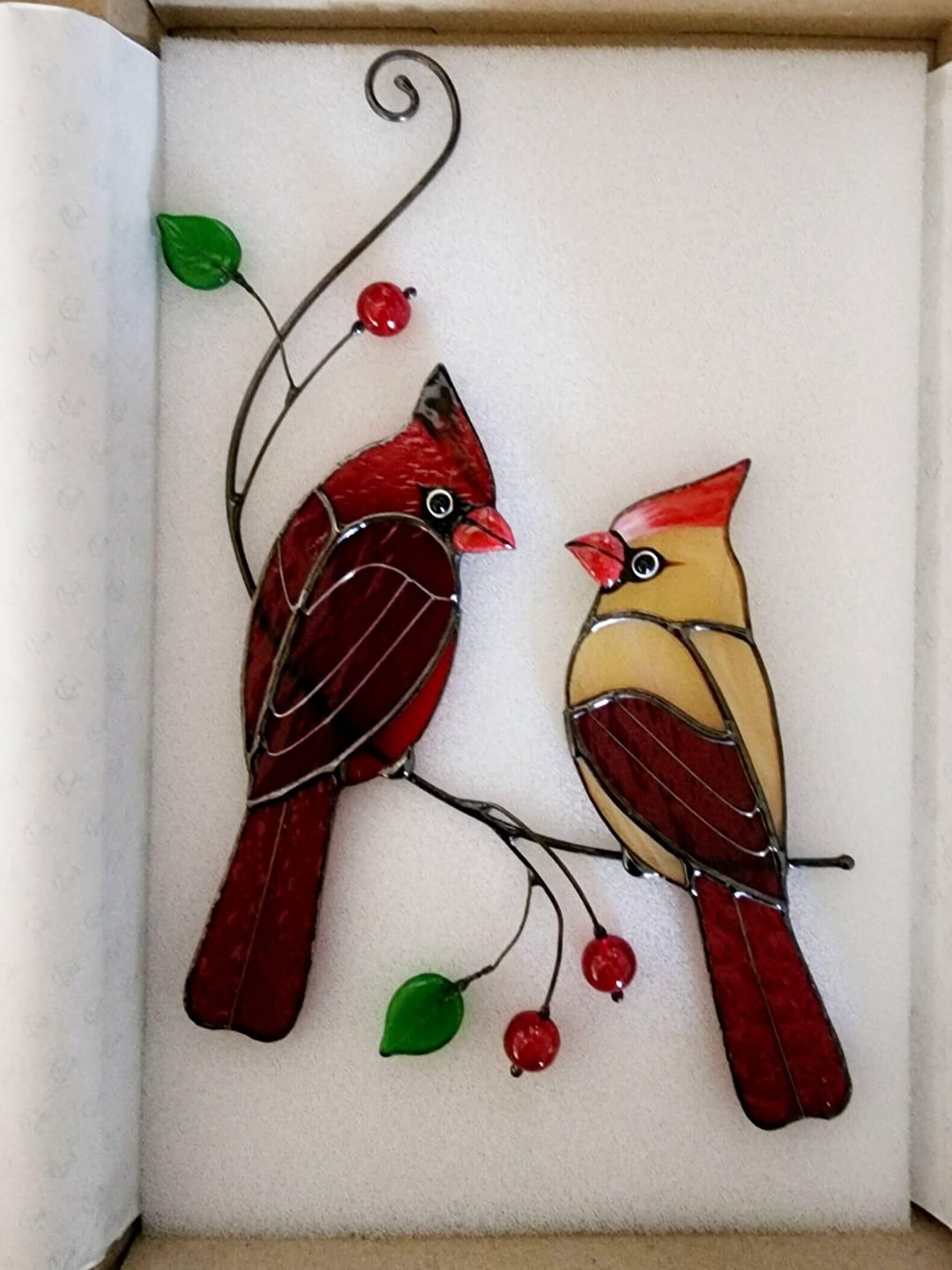 Customer photo review of Hugging Red Cardinals
