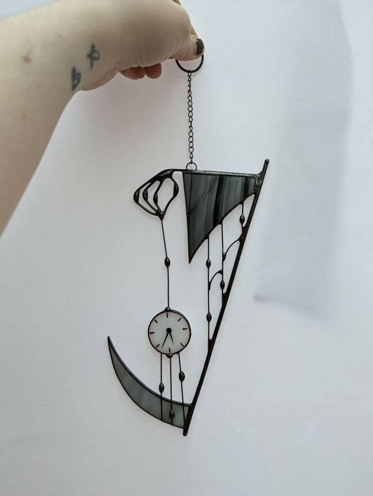 Customer photo review of Suncatcher stained glass "Hand of Death"