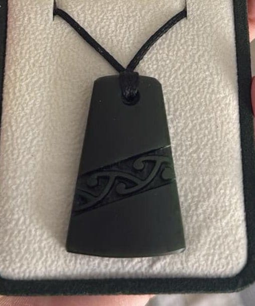 Customer photo review of Genuine NZ Greenstone Toki Necklace with Kowhaiwhai Carving