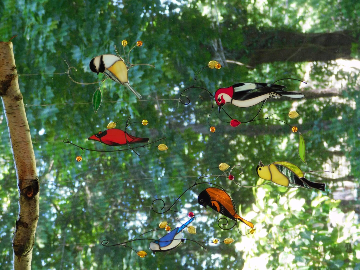 Customer photo review of Blue Jay stained glass bird realistic on a branch