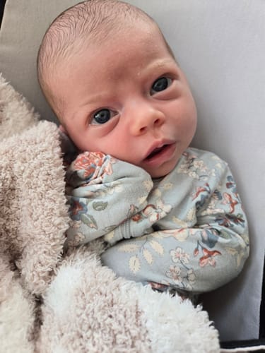 Customer photo review of Blushing Beige & White Flower Power Checkerboard Print Lovey