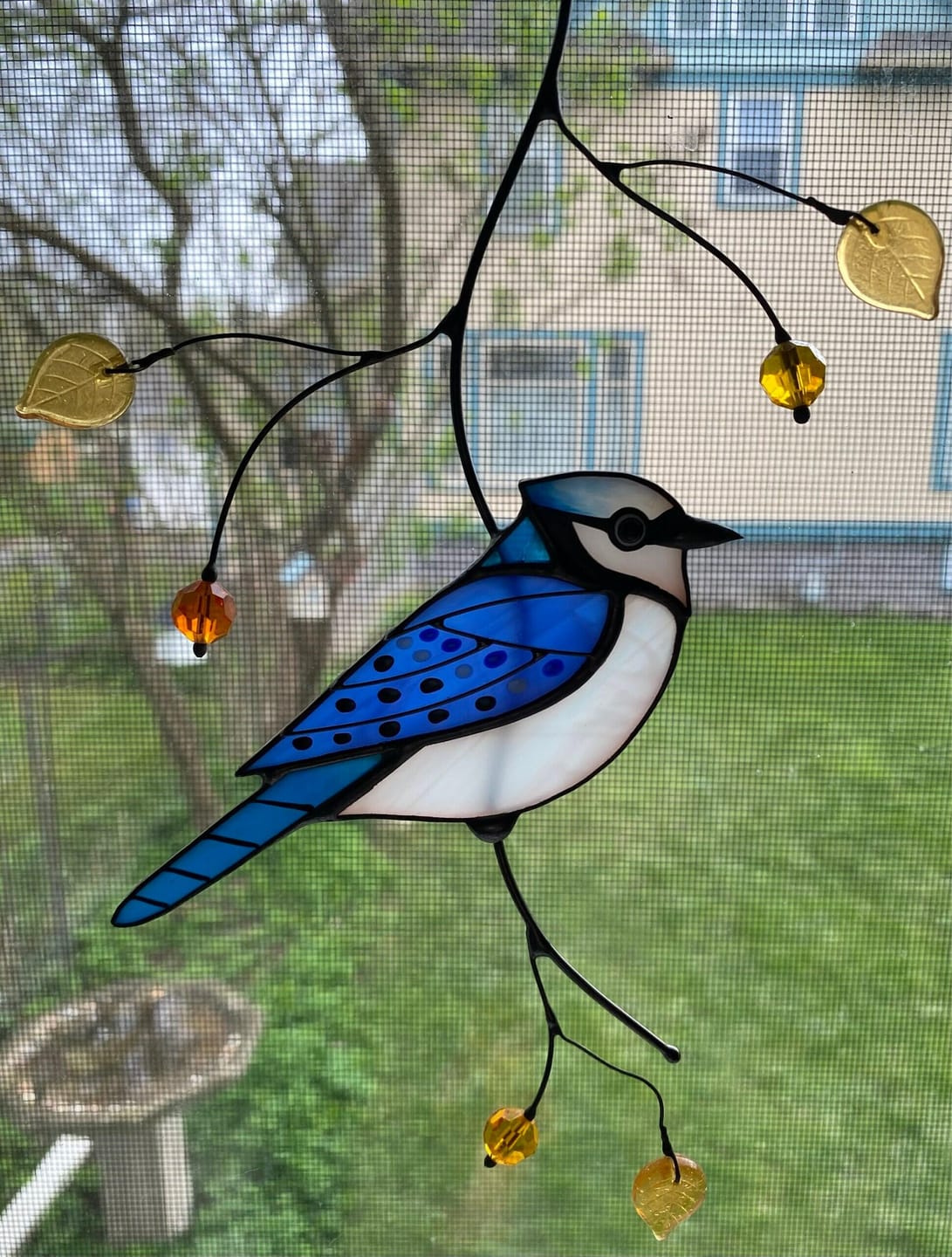 Customer photo review of Blue Jay stained glass bird realistic on a branch