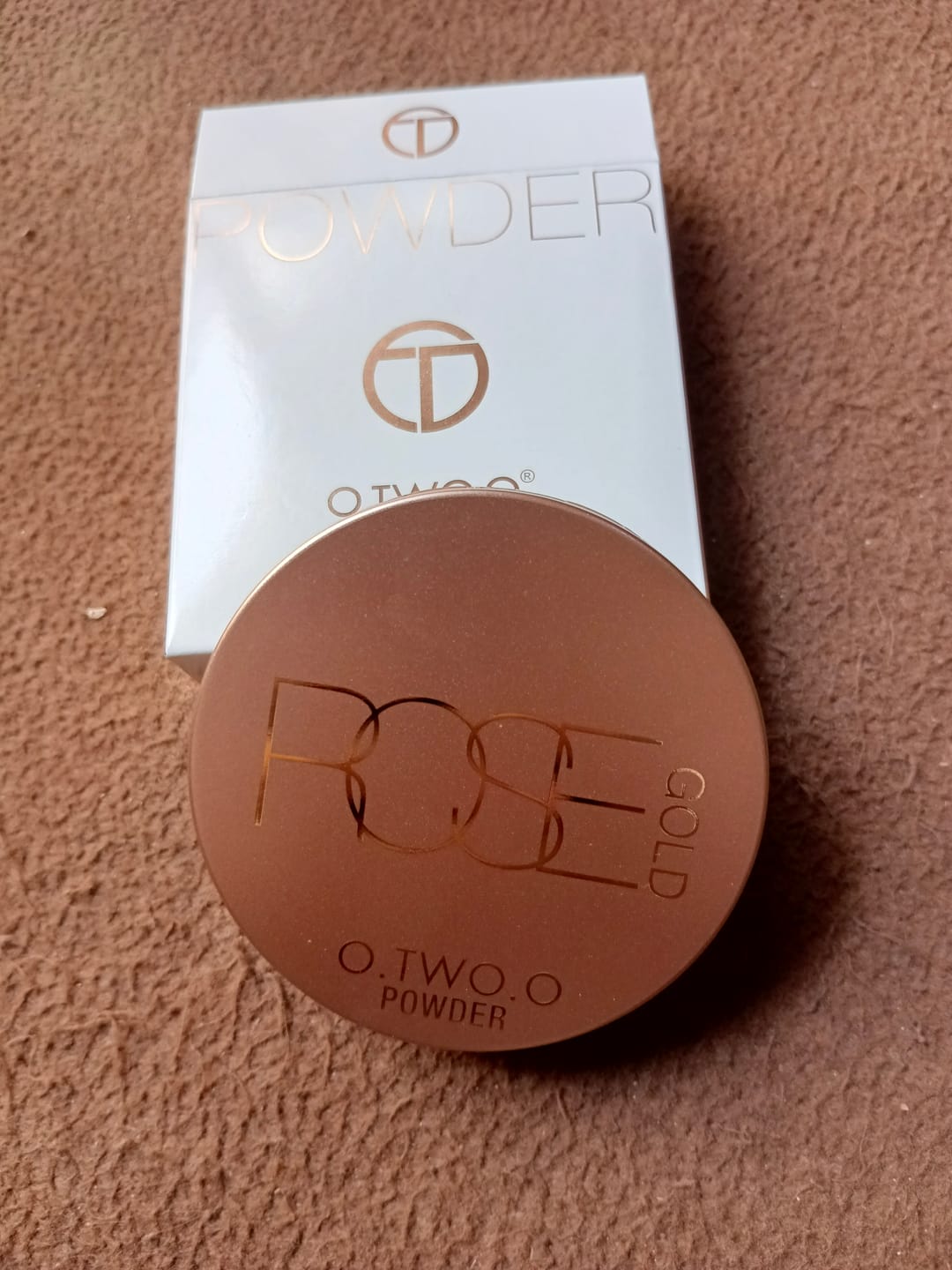 Customer photo review of O.TWO.O ROSE GOLD COMPACT POWDER