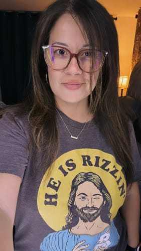 Customer photo review of He Is Rizzin' Tee