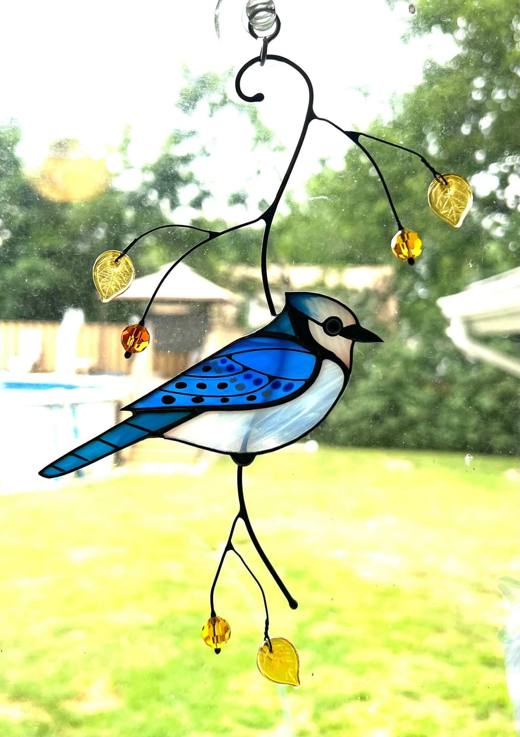 Customer photo review of Blue Jay stained glass bird realistic on a branch
