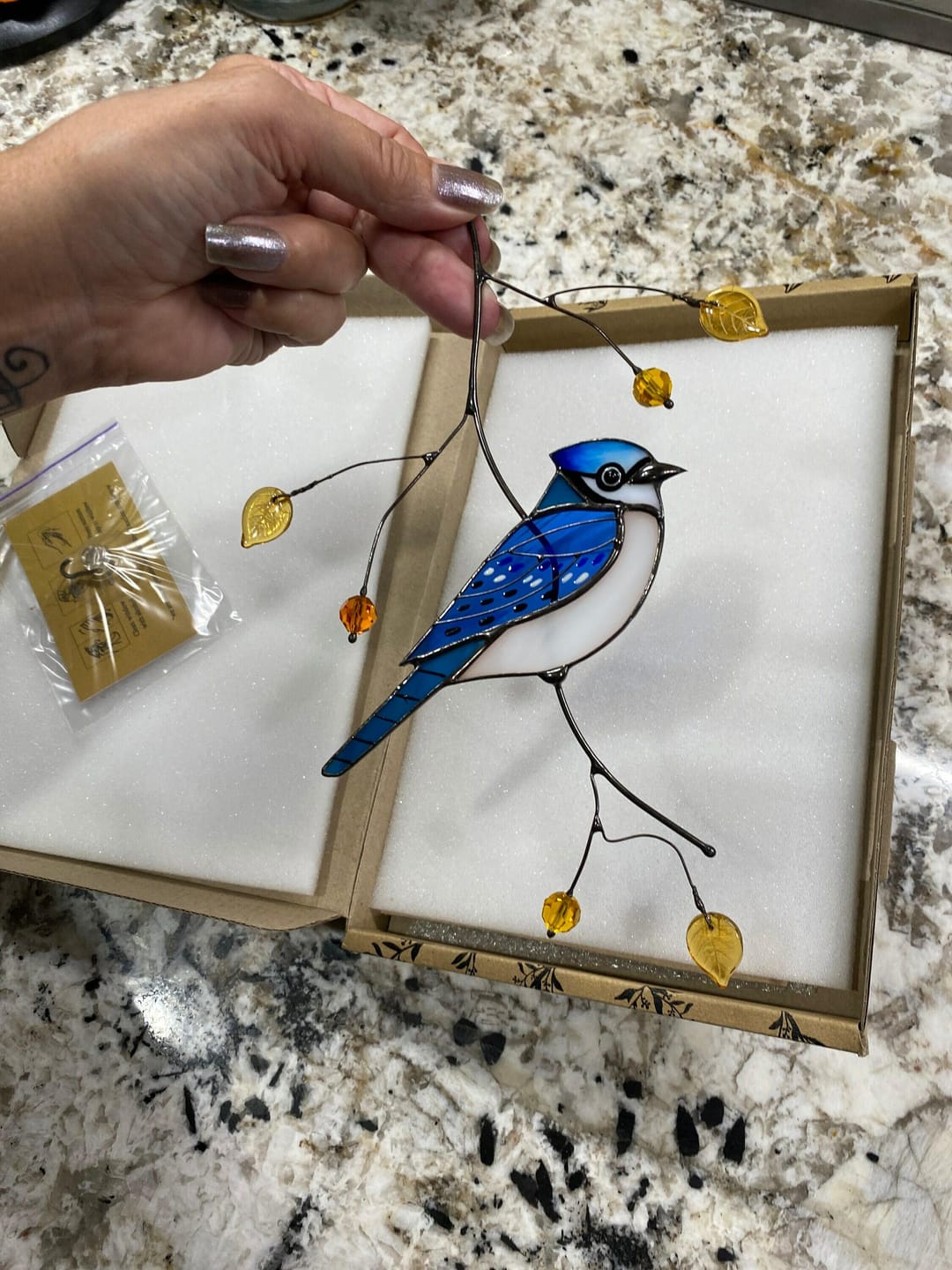 Customer photo review of Blue Jay stained glass bird realistic on a branch