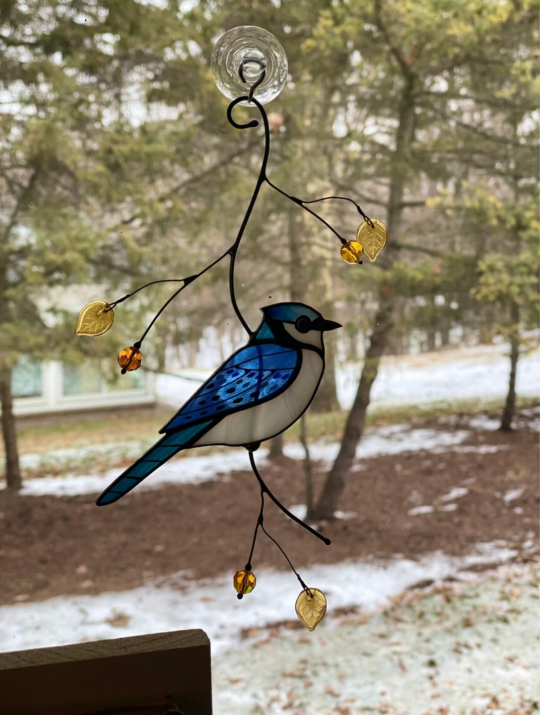 Customer photo review of Blue Jay stained glass bird realistic on a branch