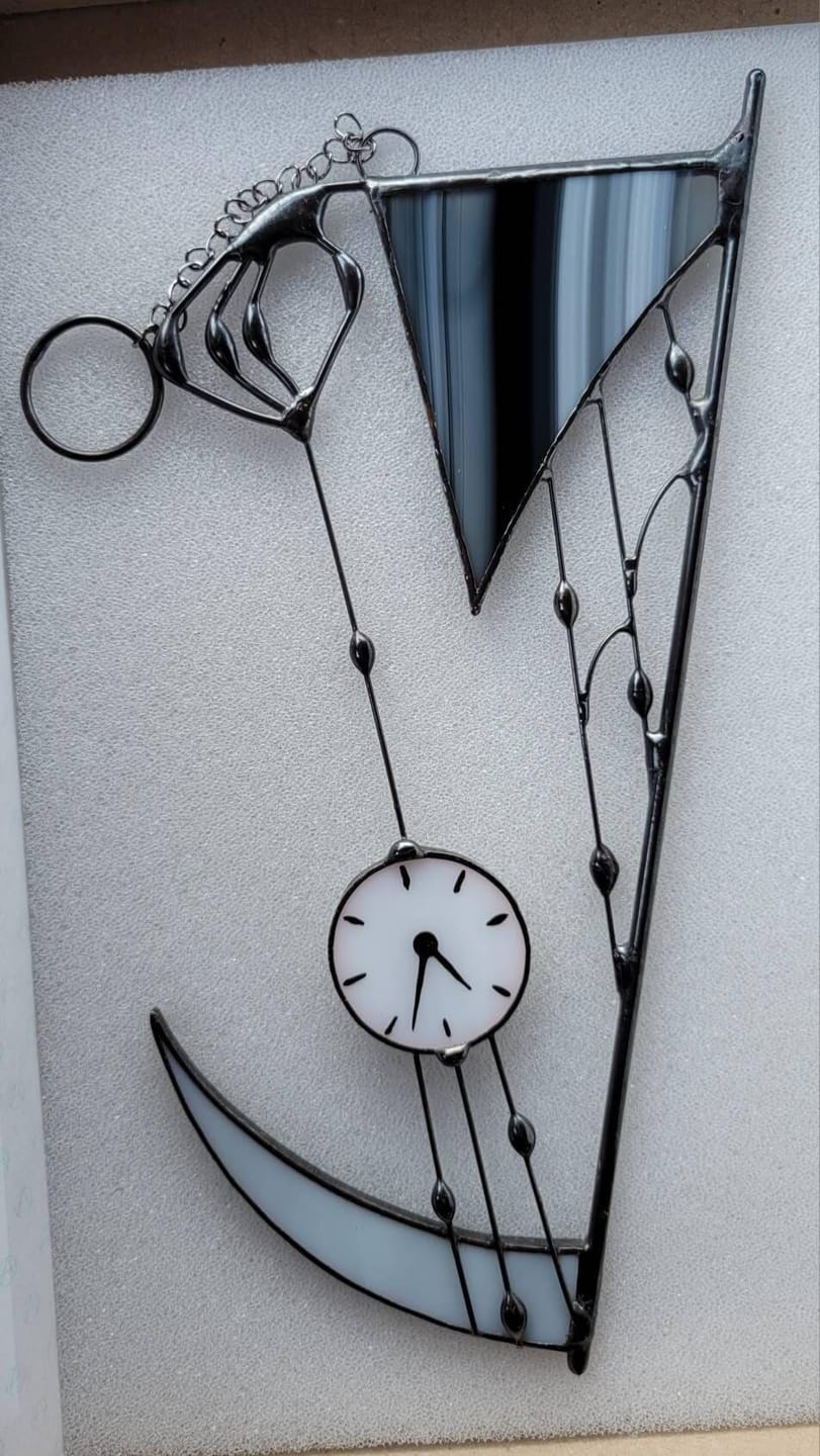 Customer photo review of Suncatcher stained glass "Hand of Death"