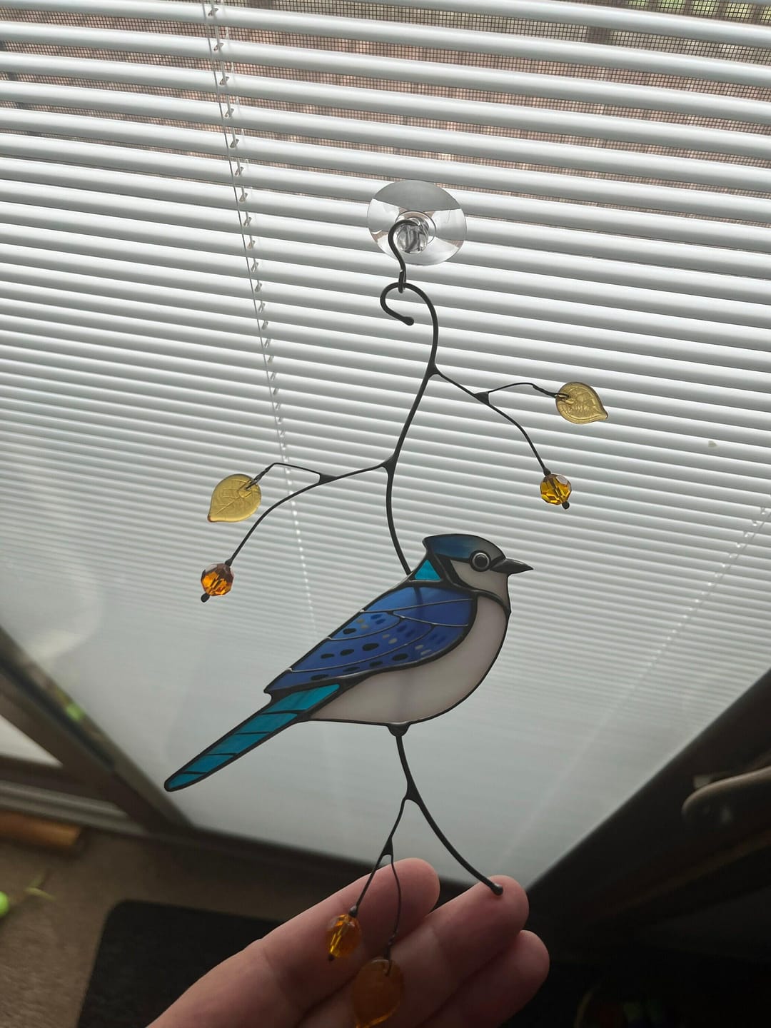 Customer photo review of Blue Jay stained glass bird realistic on a branch