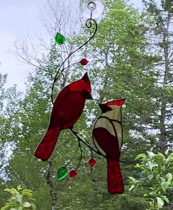 Customer photo review of Hugging Red Cardinals