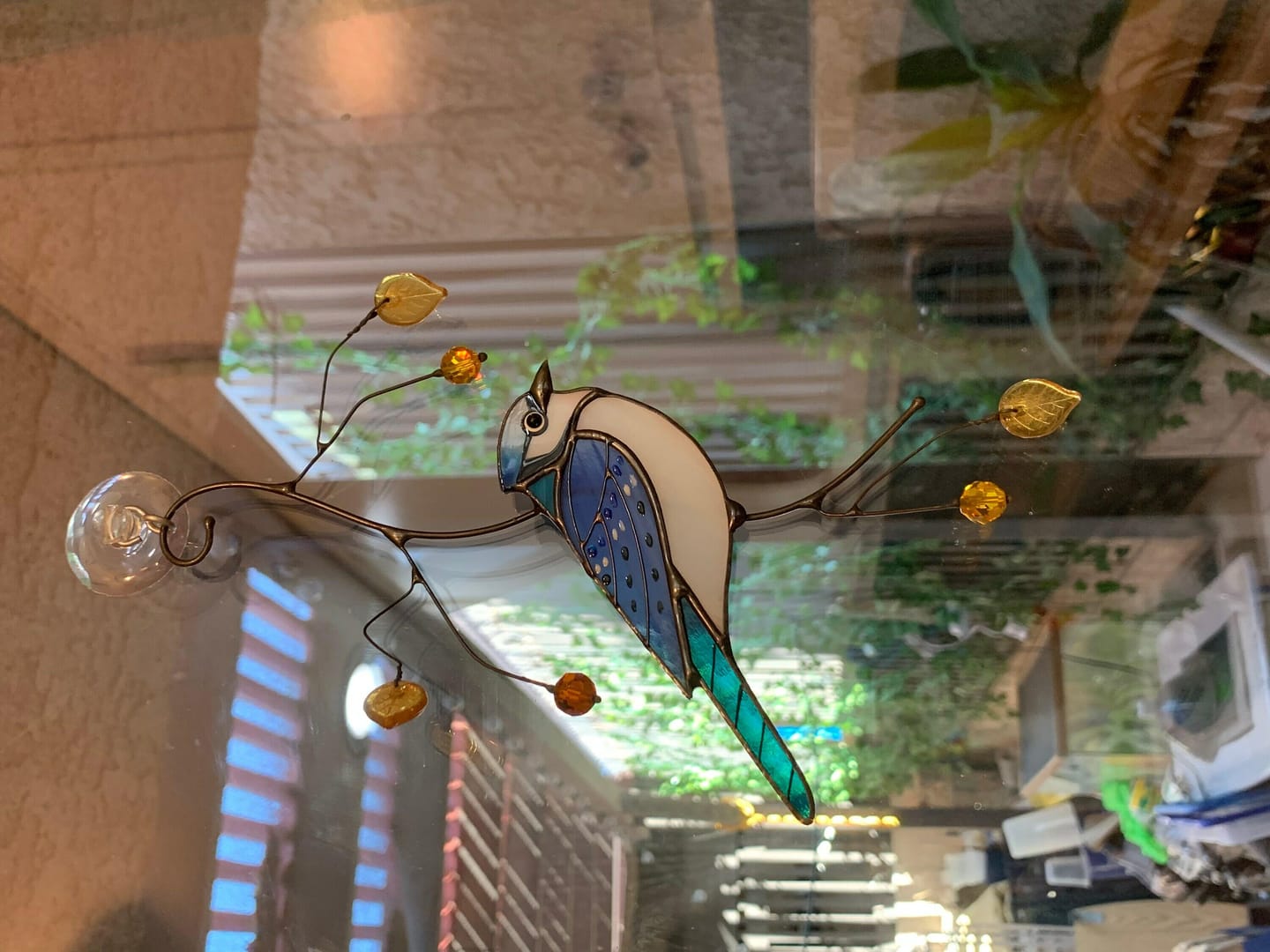 Customer photo review of Blue Jay stained glass bird realistic on a branch