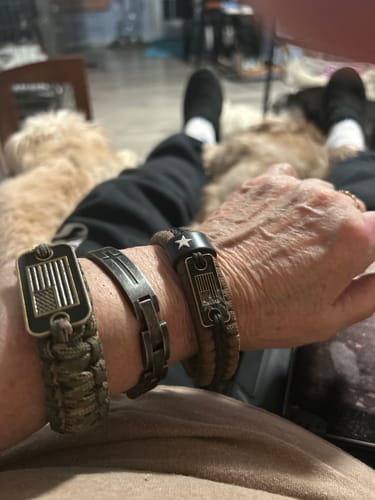 Customer photo review of Lord's Prayer Bracelet (Size M-L or L-XL): Helps Pair Veterans With A Service Dog Or Shelter Dog