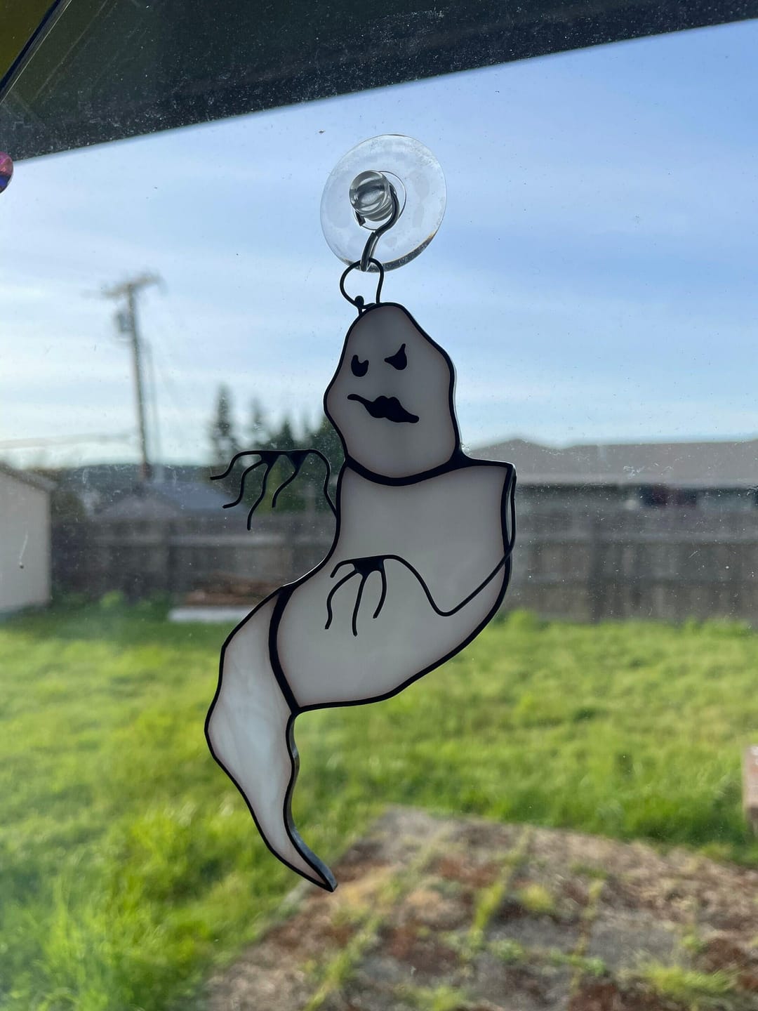 Customer photo review of Stained glass suncatcher "Crooked Ghost"