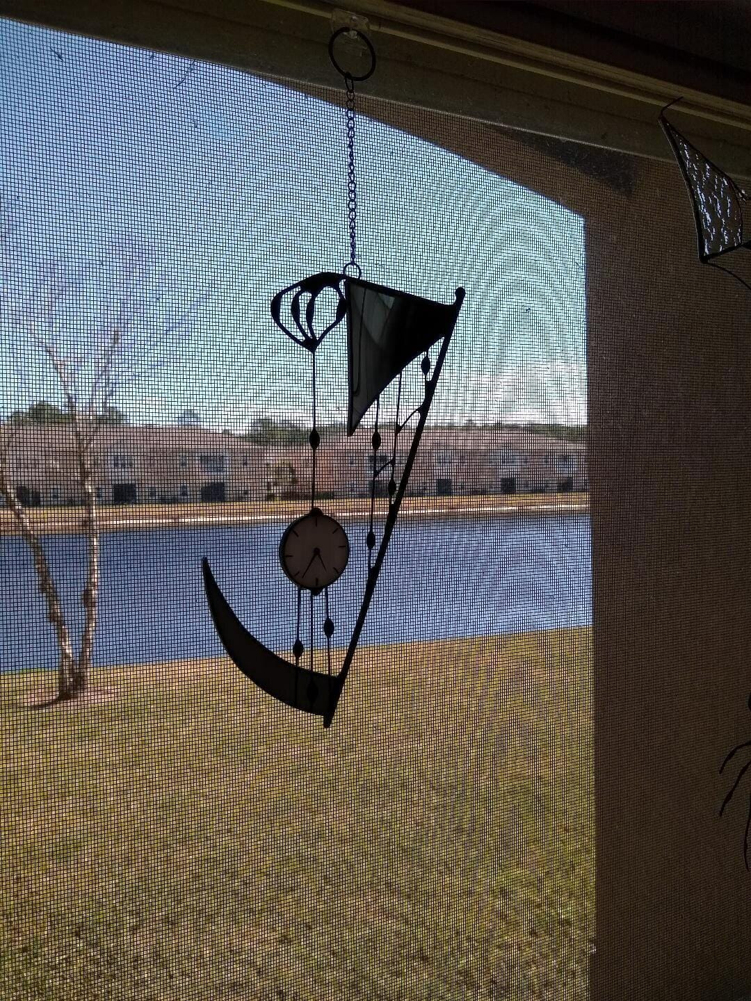 Customer photo review of Suncatcher stained glass "Hand of Death"