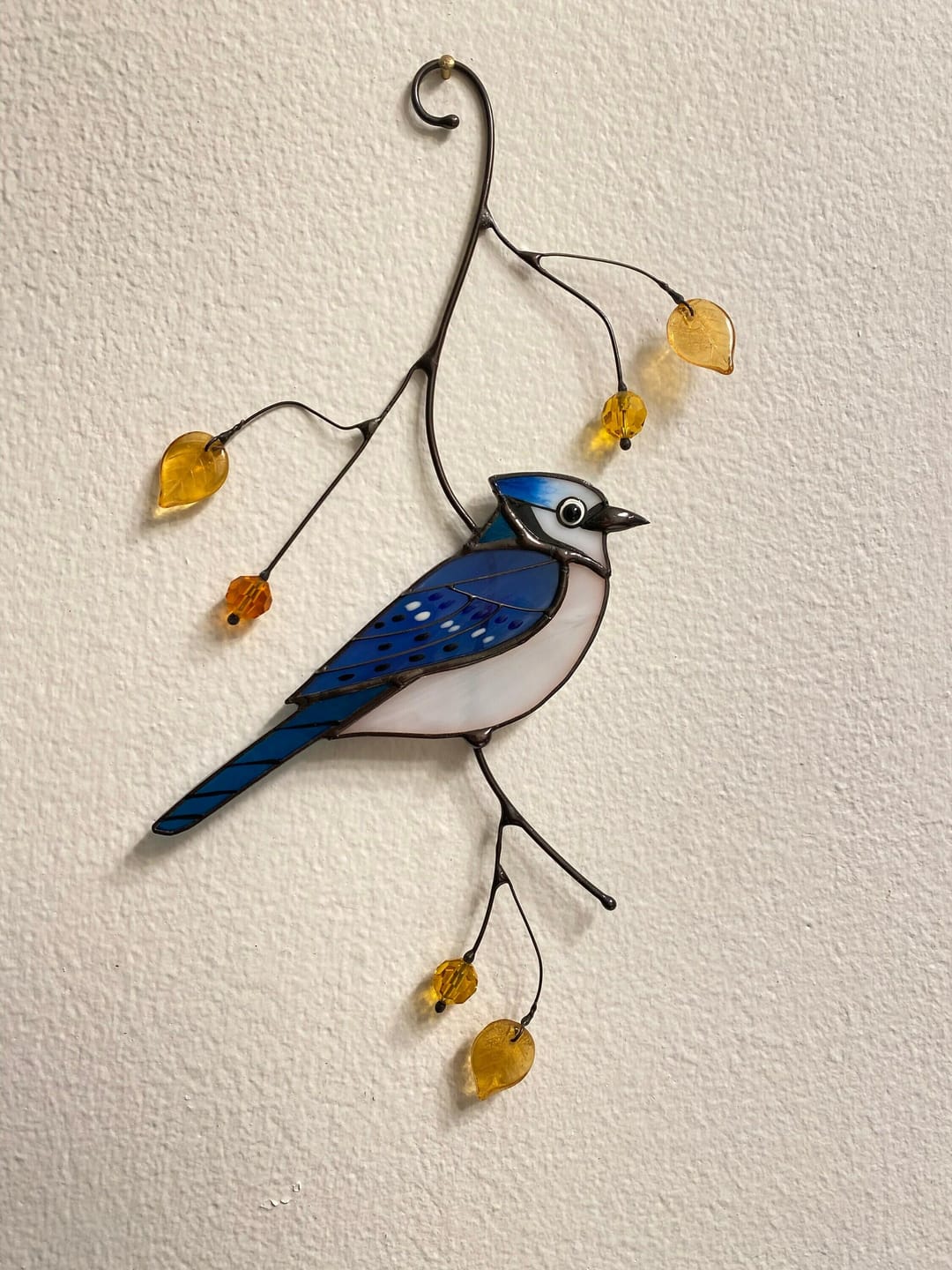 Customer photo review of Blue Jay stained glass bird realistic on a branch