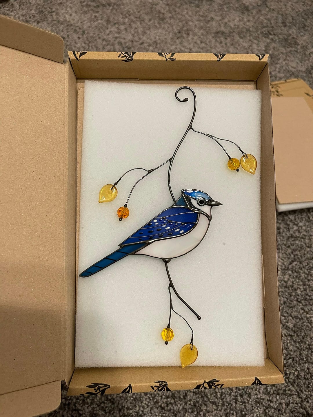 Customer photo review of Blue Jay stained glass bird realistic on a branch