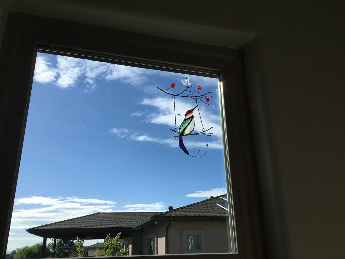 Customer photo review of Purple Hummingbird Suncatcher