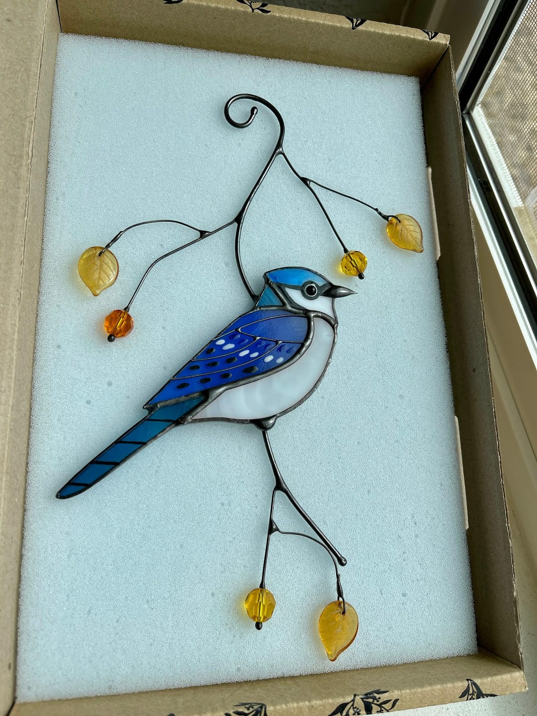 Customer photo review of Blue Jay stained glass bird realistic on a branch
