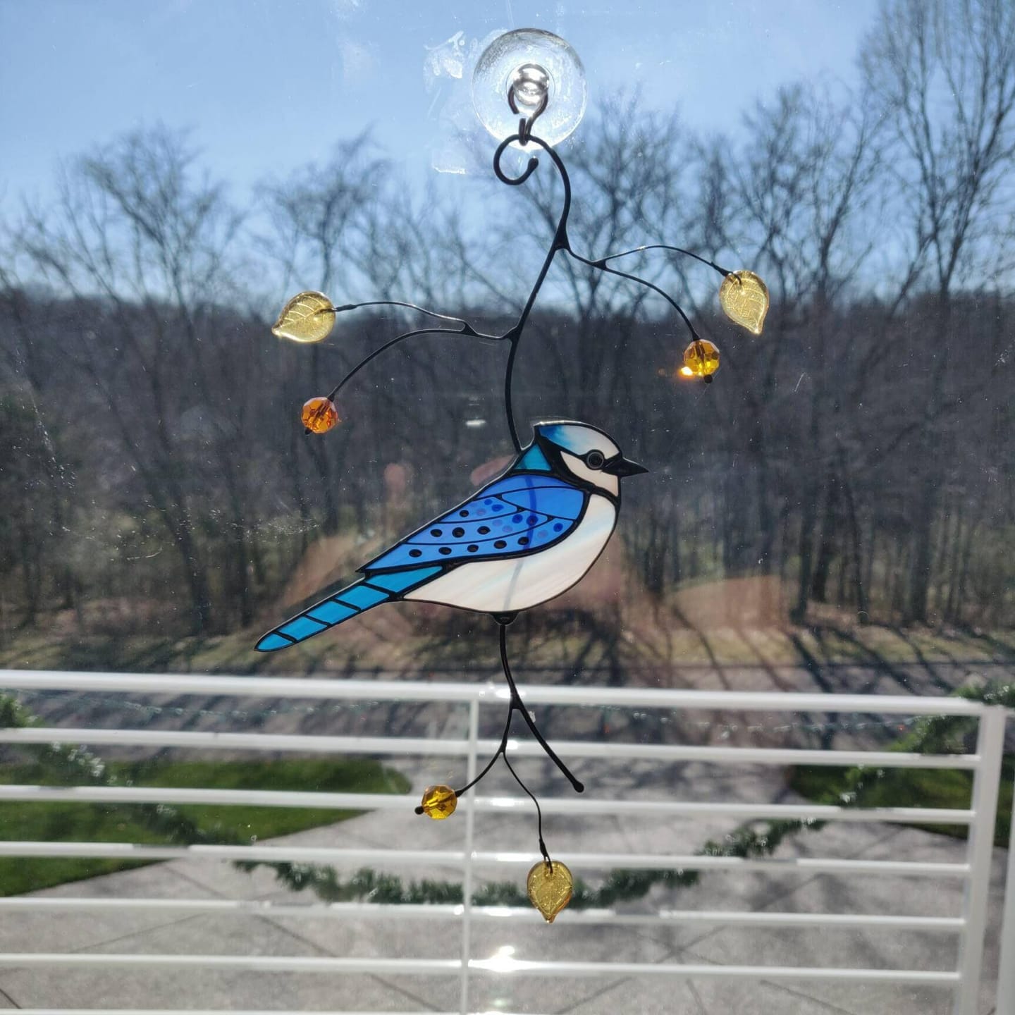 Customer photo review of Blue Jay stained glass bird realistic on a branch