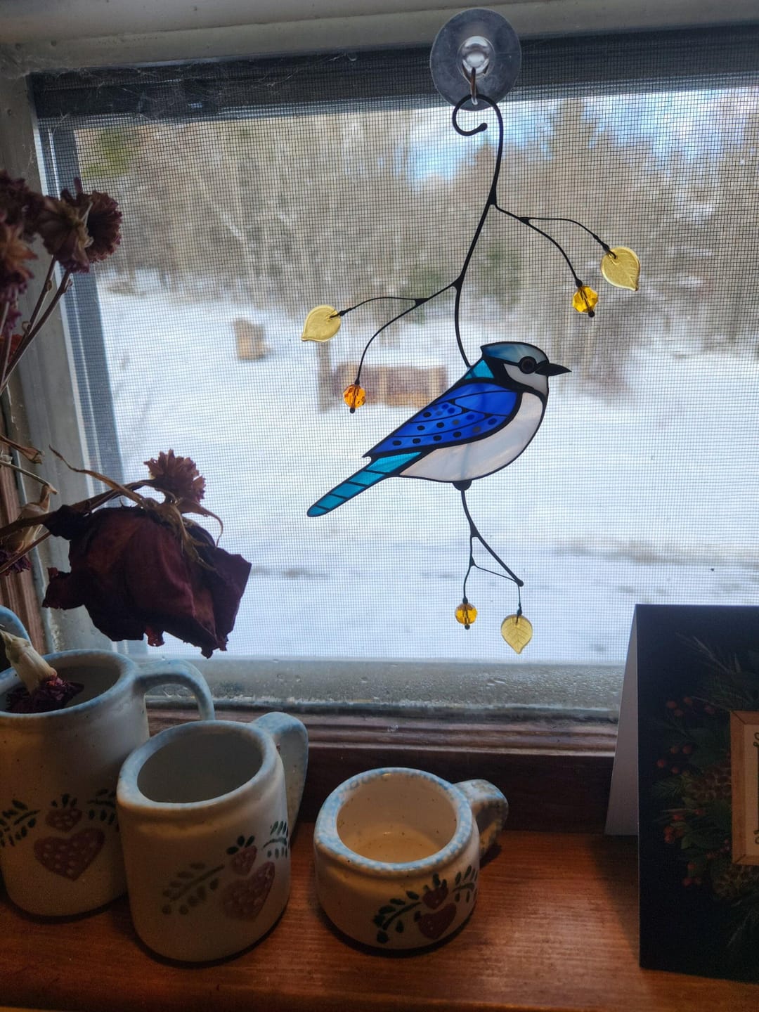 Customer photo review of Blue Jay stained glass bird realistic on a branch