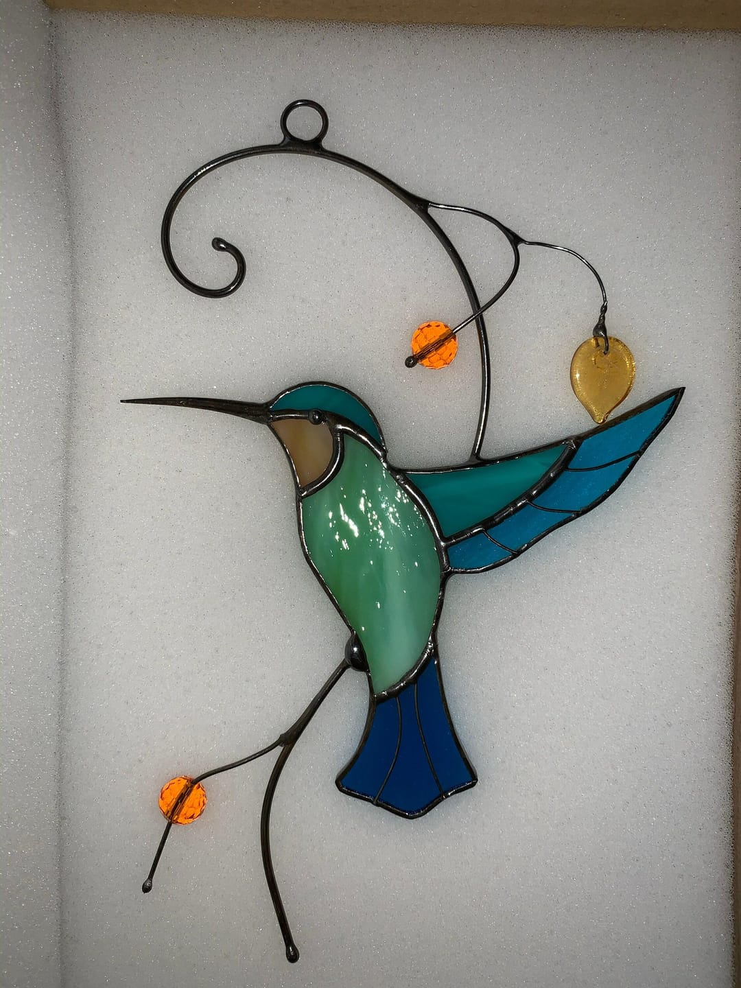 Customer photo review of Hummingbird Taking Off from a Branch suncatcher