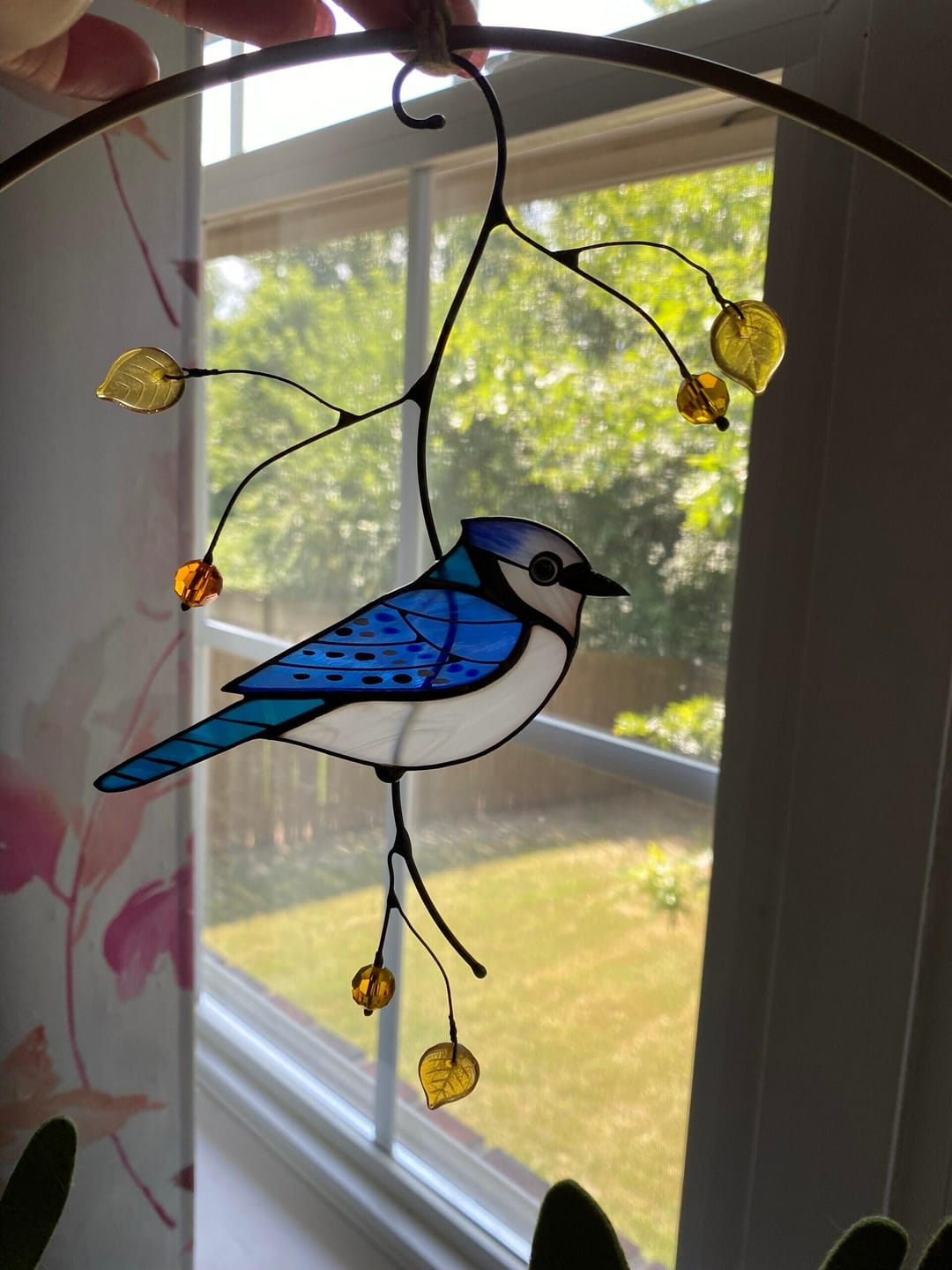 Customer photo review of Blue Jay stained glass bird realistic on a branch