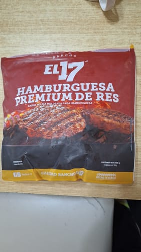 Reseña con foto de un cliente sobre Hamburguesa Premium