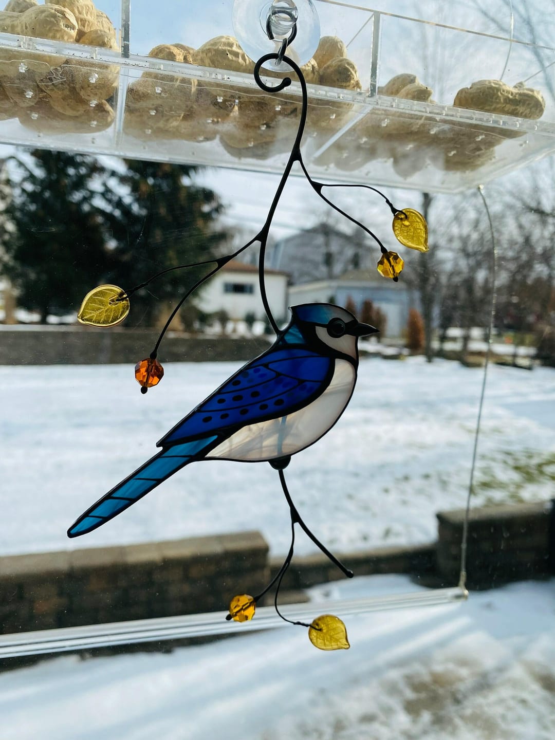 Customer photo review of Blue Jay stained glass bird realistic on a branch
