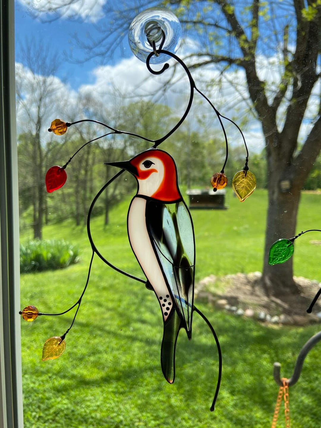Customer photo review of Woodpecker Suncatcher