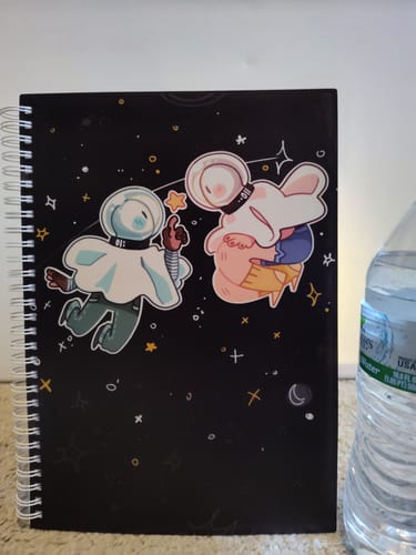 Customer photo review of Space Ghosts Duo Large Reusable Sticker Book