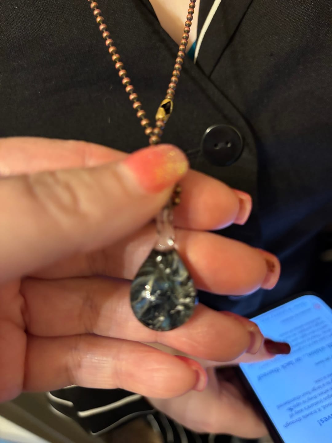 Customer photo review of Ghost Pendant with Infused Cremation Ashes